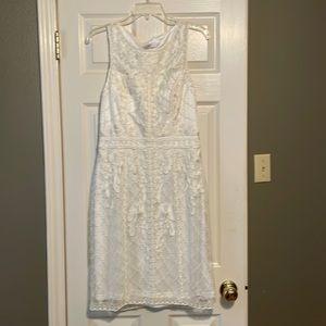 Beautiful lace detail dress. Worn only once for a wedding event.